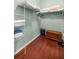 Organized walk-in closet with shelving for efficient storage at 1204 Flamingo Pl, The Villages, FL 32162