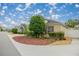 Well-maintained home with lush landscaping and inviting curb appeal at 1204 Flamingo Pl, The Villages, FL 32162