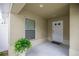 Inviting front porch with a well-maintained entrance at 1204 Flamingo Pl, The Villages, FL 32162