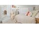 Relaxing bedroom with stylish furniture, soft lighting, and a comfortable king sized bed at 12335 Se 130Th Ct, Ocklawaha, FL 32179
