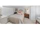 Comfortable bedroom featuring a cozy bed, neutral decor, and ample closet space at 12335 Se 130Th Ct, Ocklawaha, FL 32179