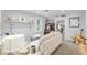 Comfortable living room with neutral tones, stylish decor, and ample natural light creating a relaxing atmosphere at 12335 Se 130Th Ct, Ocklawaha, FL 32179