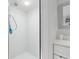 Bright and clean shower with white tile, modern fixtures, and ample space at 12335 Se 130Th Ct, Ocklawaha, FL 32179