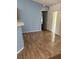 The dining area features wood floors and sliding doors leading to the outside at 13155 Sw 73 Ave, Ocala, FL 34473