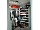 Organized closet with shelving for shoes, hanging clothes, and overhead track lighting at 14126 Greater Pines Blvd, Clermont, FL 34711