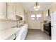 Cozy kitchen with bright cabinets and countertops at 1434 Se Silver Springs Pl, Ocala, FL 34471