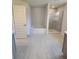 Bright bathroom features a soaking tub with tiled shower and glass door at 15055 Sw 25Th Cir, Ocala, FL 34473