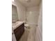 Functional bathroom with modern vanity, toilet, and shower/tub combo at 15055 Sw 25Th Cir, Ocala, FL 34473