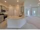 Modern kitchen featuring gray cabinets, stainless steel appliances, and a granite countertop island at 15055 Sw 25Th Cir, Ocala, FL 34473