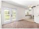 The bathroom features a soaking tub and the doorway gives access to the bedroom and double doors to the deck at 15621 Se 103Rd Ter, Summerfield, FL 34491