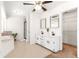 Bright bathroom features a double vanity, walk-in shower, soaking tub, and walk-in closet for ample storage at 15621 Se 103Rd Ter, Summerfield, FL 34491