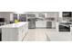 A gourmet kitchen is enhanced with stainless steel appliances, countertops, and tile floors at 15621 Se 103Rd Ter, Summerfield, FL 34491
