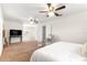 Large main bedroom features neutral tones, two ceiling fans, and natural light at 15621 Se 103Rd Ter, Summerfield, FL 34491