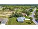 Aerial view showcasing the property's location within a lush, green community at 226 Locust Ln, Ocala, FL 34472