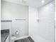 Bathroom featuring a subway tile shower, granite countertop, and gray floor at 226 Locust Ln, Ocala, FL 34472