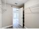 Walk-in closet with an open door to the bedroom at 226 Locust Ln, Ocala, FL 34472