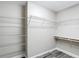 A walk-in closet with metal shelving on the walls at 226 Locust Ln, Ocala, FL 34472