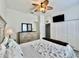 This bedroom has a ceiling fan and large closet providing ample storage at 2515 Nw 53 Ave, Ocala, FL 34482