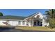 Exterior shot of the Ocala Palms clubhouse in a golf community at 2515 Nw 53 Ave, Ocala, FL 34482