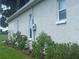 Exterior view of a property that features a beautiful garden area with flowering plants at 2515 Nw 53 Ave, Ocala, FL 34482