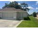 This spacious garage features a screened-in door for natural light and outdoor accessibility at 2515 Nw 53 Ave, Ocala, FL 34482