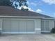 Single story home with a two car garage and a separate golf cart garage at 2515 Nw 53 Ave, Ocala, FL 34482