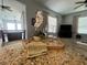 Close-up of granite countertops and an orchid in an open plan home at 2515 Nw 53 Ave, Ocala, FL 34482