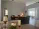 Comfortable living room with stylish decor and easy access to dining area at 2515 Nw 53 Ave, Ocala, FL 34482