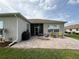 Spacious outdoor patio area with comfortable seating and barbecue at 2515 Nw 53 Ave, Ocala, FL 34482