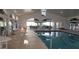Bright indoor pool with lounge chairs and beautiful views at 2515 Nw 53 Ave, Ocala, FL 34482