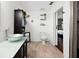 Chic bathroom with glass bowl sink, a decorative storage cabinet, and modern accents at 32 Dogwood Drive Loop, Ocala, FL 34472