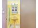 Bathroom featuring a yellow sink and a medicine cabinet at 3621 Se 12Th Pl, Ocala, FL 34471