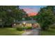 Charming home with large windows and a neatly landscaped front yard at 3621 Se 12Th Pl, Ocala, FL 34471