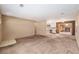 This living room is connected to the kitchen and has views of the fireplace at 3621 Se 12Th Pl, Ocala, FL 34471