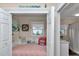 Cozy bedroom with closet, nautical decor, and comfortable furnishings at 4550 County Road 104, Oxford, FL 34484