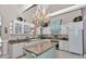 Gourmet kitchen with custom cabinets, granite countertops and a center island at 4550 County Road 104, Oxford, FL 34484