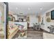 Bright living room with coastal decor, comfortable seating, and dining area at 4550 County Road 104, Oxford, FL 34484