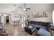 Open-concept living area with comfortable seating and an adjacent dining space at 5063 Se 168Th Ter, Ocklawaha, FL 32179