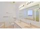 Large bathroom features double sinks, a large mirror, and ample vanity space at 5551 Nw 25Th Loop, Ocala, FL 34482