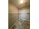 Spacious walk-in closet with a tile floor and metal racking at 6241 Sw 84Th Pl, Ocala, FL 34476