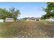 Large backyard featuring home and detached storage shed at 6320 Se 42Nd Ct, Ocala, FL 34480