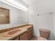 Full bathroom featuring vanity with sink and a separate tiled shower at 6320 Se 42Nd Ct, Ocala, FL 34480