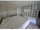 Bedroom featuring a built-in wall unit with storage drawers and shelving for ample organization at 741 Truman Ave, Lady Lake, FL 32159