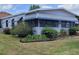Charming single-story home with a well-maintained lawn and tidy landscaping at 741 Truman Ave, Lady Lake, FL 32159