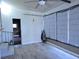 Sun Room features laminate floors, a ceiling fan, and large window letting in natural light at 741 Truman Ave, Lady Lake, FL 32159