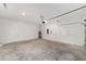 Spacious and bright garage with high ceilings and concrete floors at 7513 Sw 56Th Pl, Ocala, FL 34474