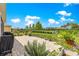 Well-kept brick patio with a barbecue grill and lawn at 7891 Sw 89Th Cir, Ocala, FL 34481