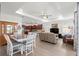 Spacious living room featuring an open floor plan and modern furnishings at 7891 Sw 89Th Cir, Ocala, FL 34481