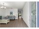 Bright living room with wood floors and an open floor plan at 7891 Sw 89Th Cir, Ocala, FL 34481