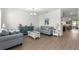 Comfortable living room featuring stylish furniture and hardwood floors at 7891 Sw 89Th Cir, Ocala, FL 34481